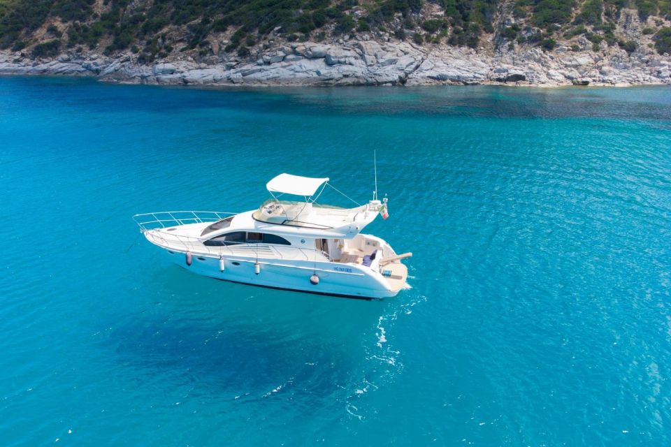 Villasimius: Day Yacht Cruise With Aperitif - Language Options and Group Size