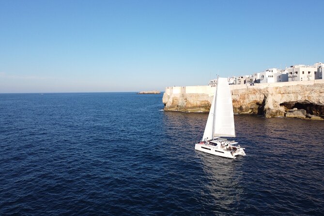 Guided Tour by Catamaran With Aperitif From Polignano a Mare - Just The Basics