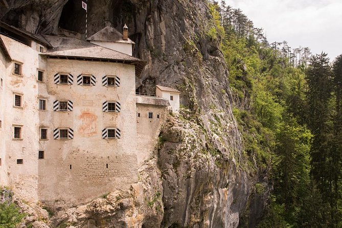 Postojna Cave and Predjama Castle From Sistiana