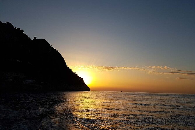 Tour in a Typical Boat of Capri at Sunset (2 Hours)