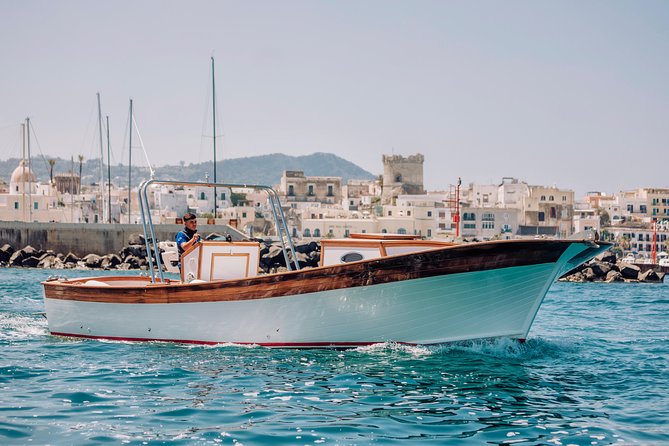 Boat Tour of the Island of Ischia With a Typical Ischia 10-Metre Launch Full Day - Pricing and Guarantee